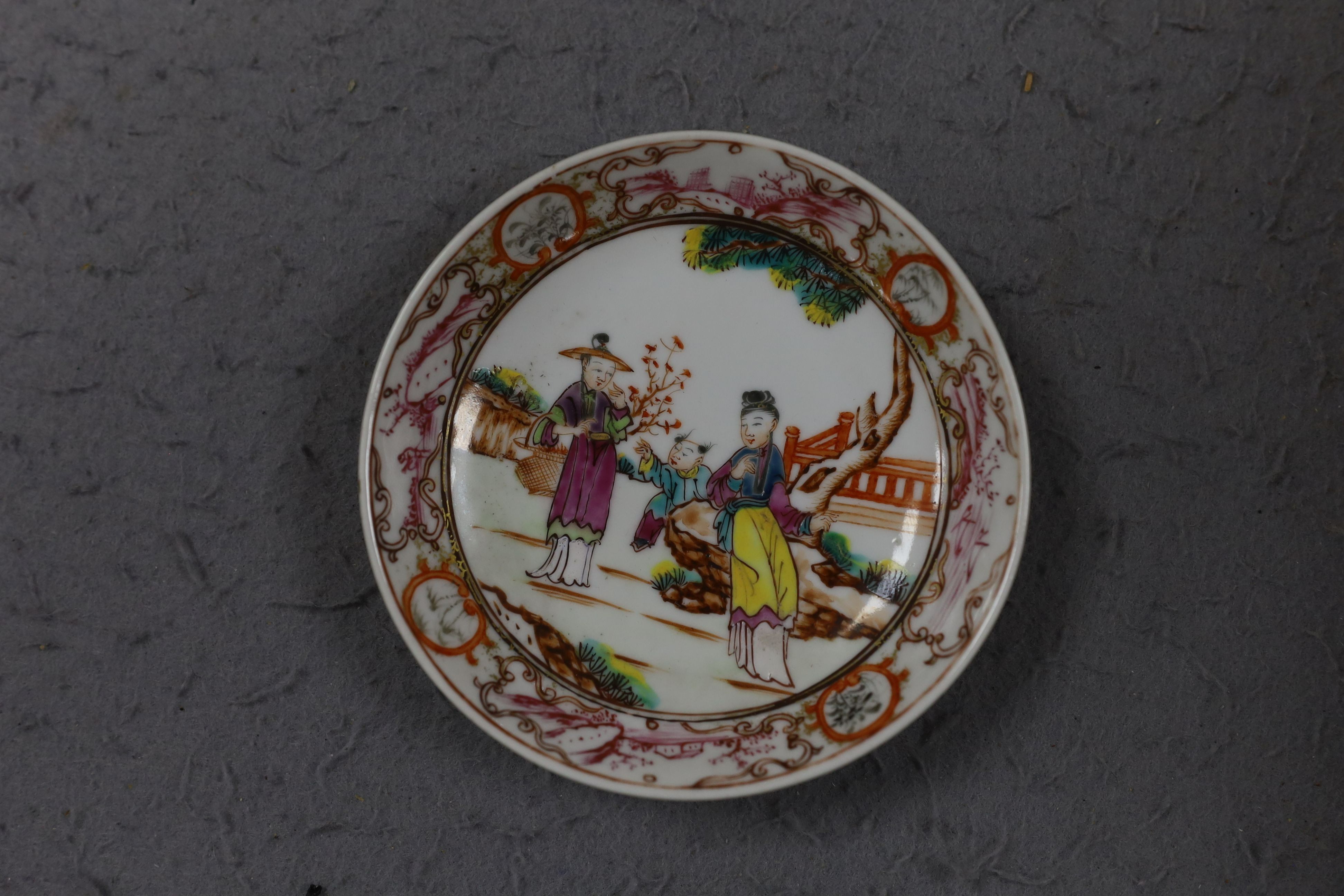 A group of four 18th century Chinese export famille rose saucers